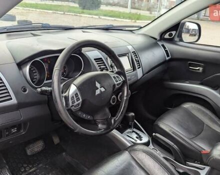 Синий Мицубиси Аутлендер, объемом двигателя 3 л и пробегом 382 тыс. км за 8200 $, фото 12 на Automoto.ua