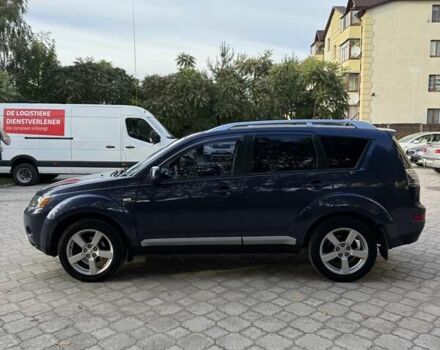 Синий Мицубиси Аутлендер, объемом двигателя 2.36 л и пробегом 223 тыс. км за 8650 $, фото 7 на Automoto.ua