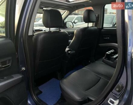 Синій Міцубісі Аутлендер, об'ємом двигуна 2.36 л та пробігом 282 тис. км за 9490 $, фото 27 на Automoto.ua