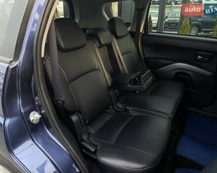 Синій Міцубісі Аутлендер, об'ємом двигуна 2.36 л та пробігом 282 тис. км за 9490 $, фото 25 на Automoto.ua