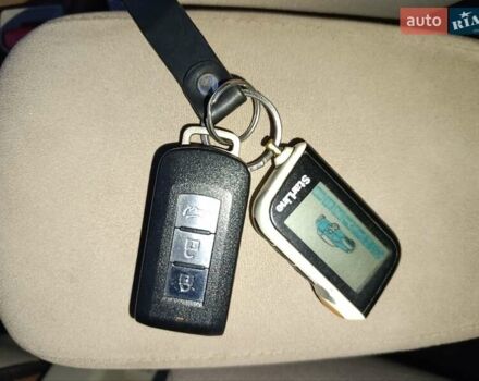 Синий Мицубиси Аутлендер, объемом двигателя 2.4 л и пробегом 264 тыс. км за 7555 $, фото 45 на Automoto.ua