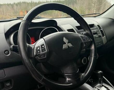 Синий Мицубиси Аутлендер, объемом двигателя 2.4 л и пробегом 211 тыс. км за 7800 $, фото 19 на Automoto.ua