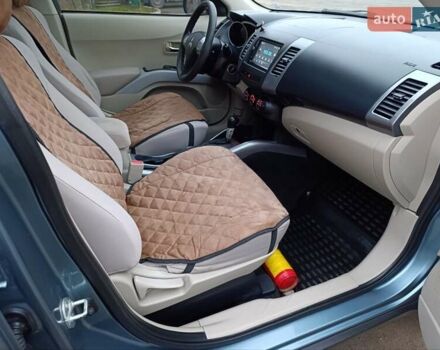 Синий Мицубиси Аутлендер, объемом двигателя 2.4 л и пробегом 264 тыс. км за 7555 $, фото 30 на Automoto.ua