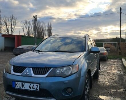 Синий Мицубиси Аутлендер, объемом двигателя 2 л и пробегом 600 тыс. км за 3500 $, фото 3 на Automoto.ua