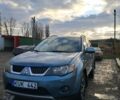 Синий Мицубиси Аутлендер, объемом двигателя 2 л и пробегом 600 тыс. км за 3500 $, фото 3 на Automoto.ua