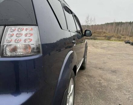 Синий Мицубиси Аутлендер, объемом двигателя 2.4 л и пробегом 211 тыс. км за 7800 $, фото 3 на Automoto.ua