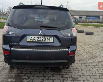 Синий Мицубиси Аутлендер, объемом двигателя 3 л и пробегом 382 тыс. км за 8200 $, фото 6 на Automoto.ua