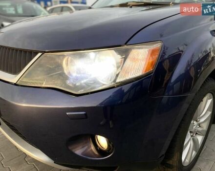 Синій Міцубісі Аутлендер, об'ємом двигуна 2.36 л та пробігом 282 тис. км за 9490 $, фото 5 на Automoto.ua