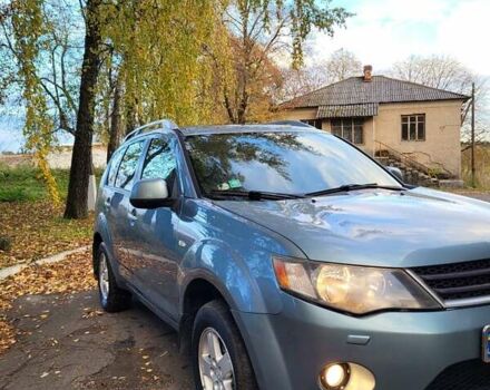 Мицубиси Аутлендер 2008 в Тернополе на Automoto.ua Синий Мицубиси Аутлендер, объемом двигателя 2.36 л и пробегом 264 тыс. км за 7500 $, фото 10 на Automoto.ua