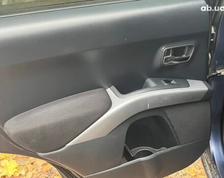 Синій Міцубісі Аутлендер, об'ємом двигуна 2.4 л та пробігом 211 тис. км за 8390 $, фото 25 на Automoto.ua