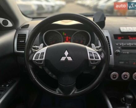 Синій Міцубісі Аутлендер, об'ємом двигуна 2.36 л та пробігом 282 тис. км за 9490 $, фото 41 на Automoto.ua