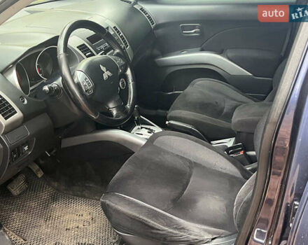 Синій Міцубісі Аутлендер, об'ємом двигуна 2.4 л та пробігом 211 тис. км за 8390 $, фото 25 на Automoto.ua