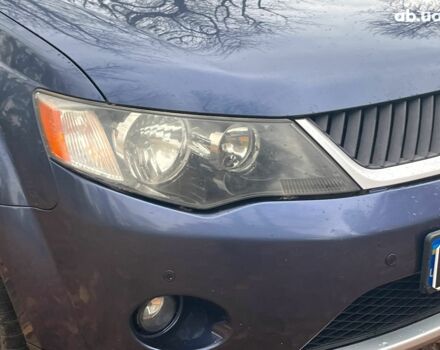 Синій Міцубісі Аутлендер, об'ємом двигуна 2.4 л та пробігом 211 тис. км за 8390 $, фото 3 на Automoto.ua