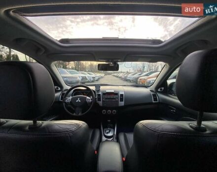 Синій Міцубісі Аутлендер, об'ємом двигуна 2.36 л та пробігом 282 тис. км за 9490 $, фото 46 на Automoto.ua