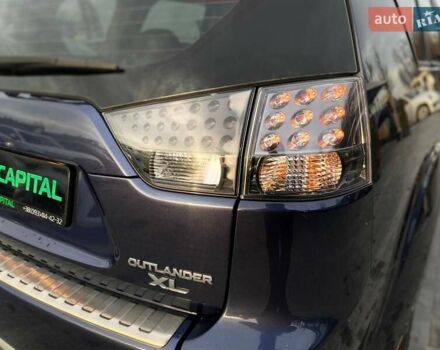 Синій Міцубісі Аутлендер, об'ємом двигуна 2.36 л та пробігом 282 тис. км за 9490 $, фото 11 на Automoto.ua