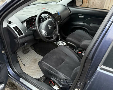 Синий Мицубиси Аутлендер, объемом двигателя 2.36 л и пробегом 269 тыс. км за 7500 $, фото 6 на Automoto.ua