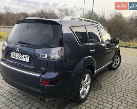 Синий Мицубиси Аутлендер, объемом двигателя 3 л и пробегом 340 тыс. км за 9555 $, фото 10 на Automoto.ua