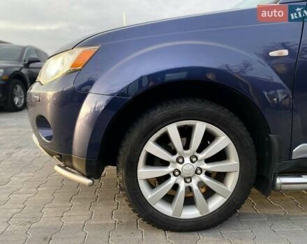 Синій Міцубісі Аутлендер, об'ємом двигуна 2.36 л та пробігом 282 тис. км за 9490 $, фото 4 на Automoto.ua