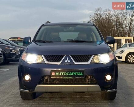Синій Міцубісі Аутлендер, об'ємом двигуна 2.36 л та пробігом 282 тис. км за 9490 $, фото 3 на Automoto.ua