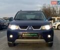 Синій Міцубісі Аутлендер, об'ємом двигуна 2.36 л та пробігом 282 тис. км за 9490 $, фото 3 на Automoto.ua