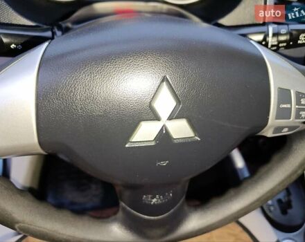 Синий Мицубиси Аутлендер, объемом двигателя 2.4 л и пробегом 264 тыс. км за 7555 $, фото 15 на Automoto.ua