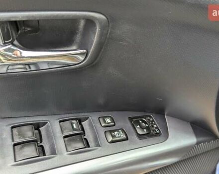 Синий Мицубиси Аутлендер, объемом двигателя 3 л и пробегом 382 тыс. км за 8200 $, фото 13 на Automoto.ua