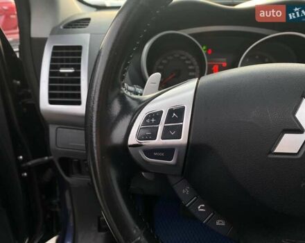 Синій Міцубісі Аутлендер, об'ємом двигуна 2.36 л та пробігом 282 тис. км за 9490 $, фото 29 на Automoto.ua