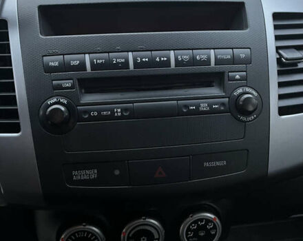 Синий Мицубиси Аутлендер, объемом двигателя 2 л и пробегом 263 тыс. км за 8900 $, фото 28 на Automoto.ua