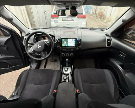 Синий Мицубиси Аутлендер, объемом двигателя 2.36 л и пробегом 269 тыс. км за 7500 $, фото 9 на Automoto.ua