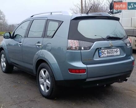 Синий Мицубиси Аутлендер, объемом двигателя 2.4 л и пробегом 264 тыс. км за 7555 $, фото 6 на Automoto.ua