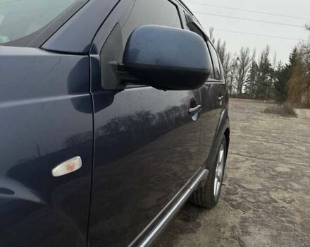 Синий Мицубиси Аутлендер, объемом двигателя 2.4 л и пробегом 211 тыс. км за 7800 $, фото 5 на Automoto.ua