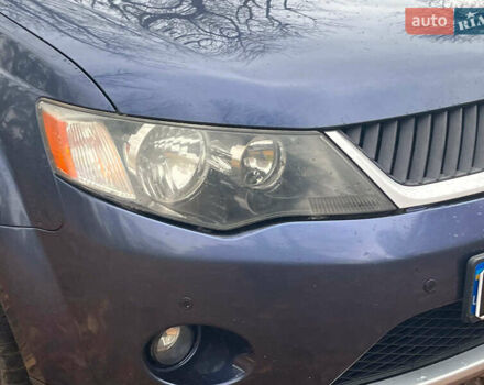 Синій Міцубісі Аутлендер, об'ємом двигуна 2.4 л та пробігом 211 тис. км за 8390 $, фото 2 на Automoto.ua