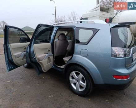 Синий Мицубиси Аутлендер, объемом двигателя 2.4 л и пробегом 264 тыс. км за 7555 $, фото 14 на Automoto.ua