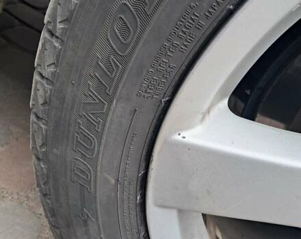 Синий Мицубиси Аутлендер, объемом двигателя 2.4 л и пробегом 160 тыс. км за 8800 $, фото 3 на Automoto.ua