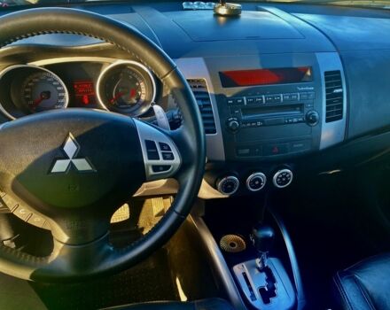 Синий Мицубиси Аутлендер, объемом двигателя 3 л и пробегом 228 тыс. км за 9000 $, фото 8 на Automoto.ua