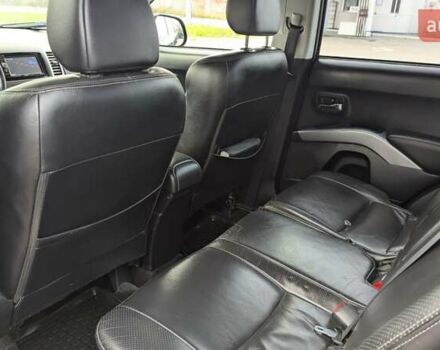 Синий Мицубиси Аутлендер, объемом двигателя 3 л и пробегом 382 тыс. км за 8200 $, фото 10 на Automoto.ua