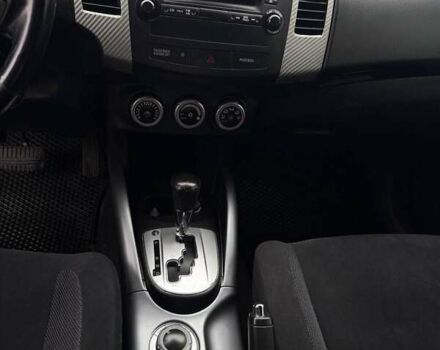 Синий Мицубиси Аутлендер, объемом двигателя 2.4 л и пробегом 211 тыс. км за 7800 $, фото 15 на Automoto.ua