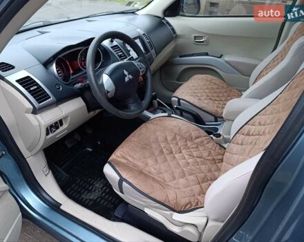 Синий Мицубиси Аутлендер, объемом двигателя 2.4 л и пробегом 264 тыс. км за 7555 $, фото 21 на Automoto.ua