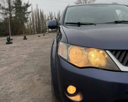 Синий Мицубиси Аутлендер, объемом двигателя 2.4 л и пробегом 211 тыс. км за 7800 $, фото 4 на Automoto.ua