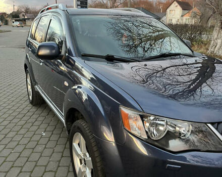 Синий Мицубиси Аутлендер, объемом двигателя 2 л и пробегом 263 тыс. км за 8900 $, фото 3 на Automoto.ua