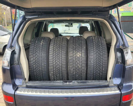 Синий Мицубиси Аутлендер, объемом двигателя 3 л и пробегом 270 тыс. км за 7900 $, фото 6 на Automoto.ua