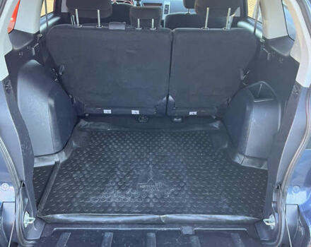 Синий Мицубиси Аутлендер, объемом двигателя 2 л и пробегом 263 тыс. км за 8900 $, фото 38 на Automoto.ua