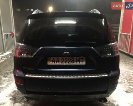 Синий Мицубиси Аутлендер, объемом двигателя 3 л и пробегом 340 тыс. км за 9555 $, фото 3 на Automoto.ua