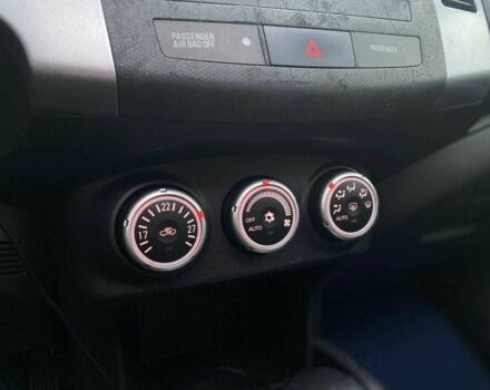 Синий Мицубиси Аутлендер, объемом двигателя 2.4 л и пробегом 282 тыс. км за 9490 $, фото 21 на Automoto.ua