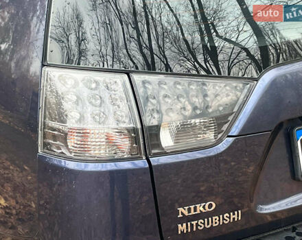 Синій Міцубісі Аутлендер, об'ємом двигуна 2.4 л та пробігом 211 тис. км за 8390 $, фото 11 на Automoto.ua