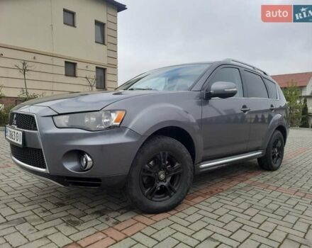 Синий Мицубиси Аутлендер, объемом двигателя 2 л и пробегом 200 тыс. км за 10500 $, фото 3 на Automoto.ua