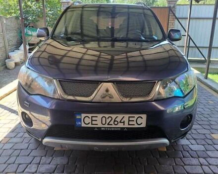 Синий Мицубиси Аутлендер, объемом двигателя 2.18 л и пробегом 205 тыс. км за 11000 $, фото 10 на Automoto.ua