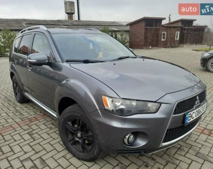 Синий Мицубиси Аутлендер, объемом двигателя 2 л и пробегом 200 тыс. км за 10500 $, фото 16 на Automoto.ua