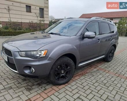 Синий Мицубиси Аутлендер, объемом двигателя 2 л и пробегом 200 тыс. км за 10500 $, фото 6 на Automoto.ua