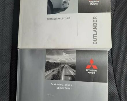 Синий Мицубиси Аутлендер, объемом двигателя 2 л и пробегом 200 тыс. км за 10500 $, фото 27 на Automoto.ua